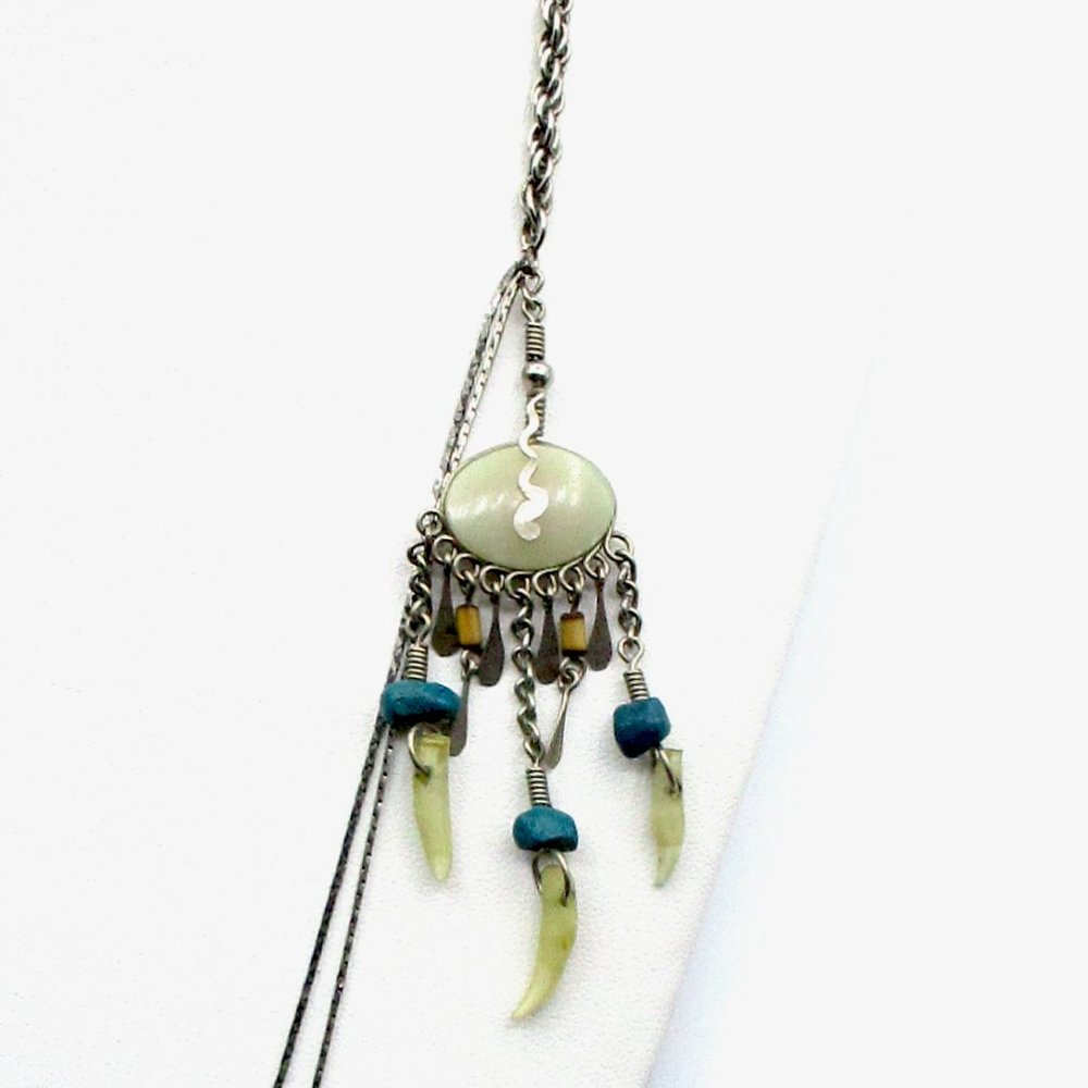 Intriguing Animal Tooth and Cream Quartz Necklace